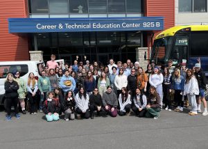 group of students pose in front of Capital Region BOCES Career and Technical Education Center