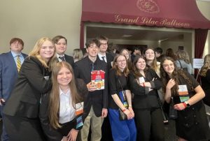 two rows of students pose for a picture