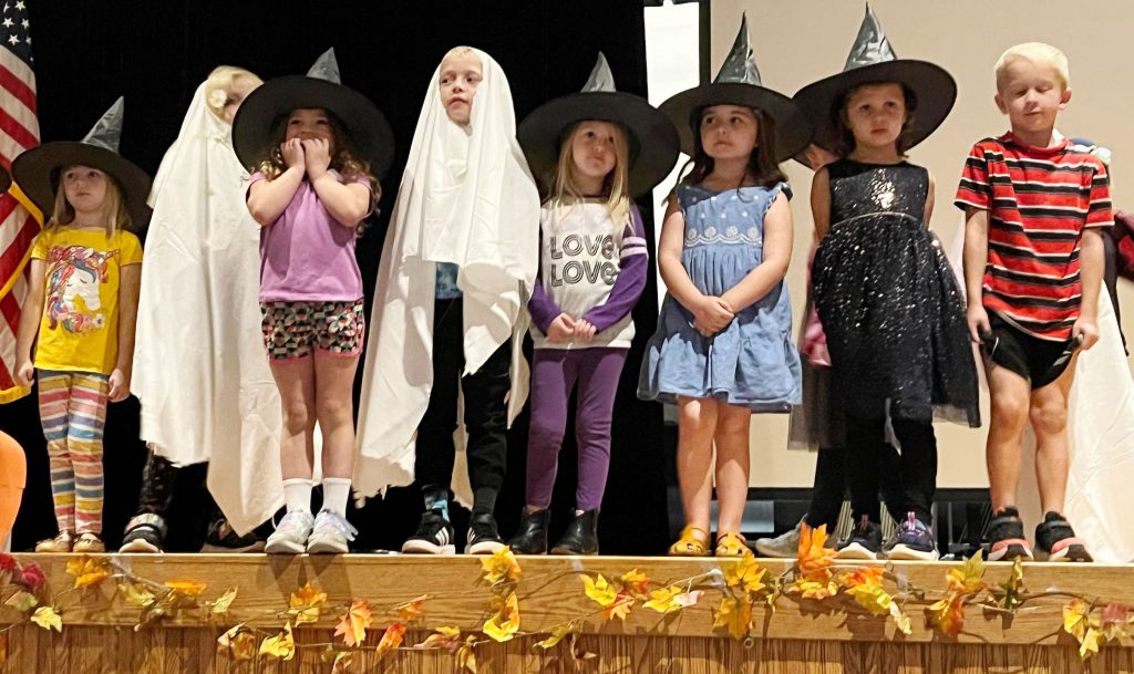Kindergarten Great Pumpkin cast on stage