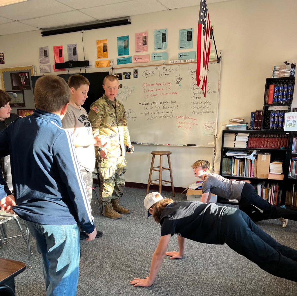 students learn to do pushups