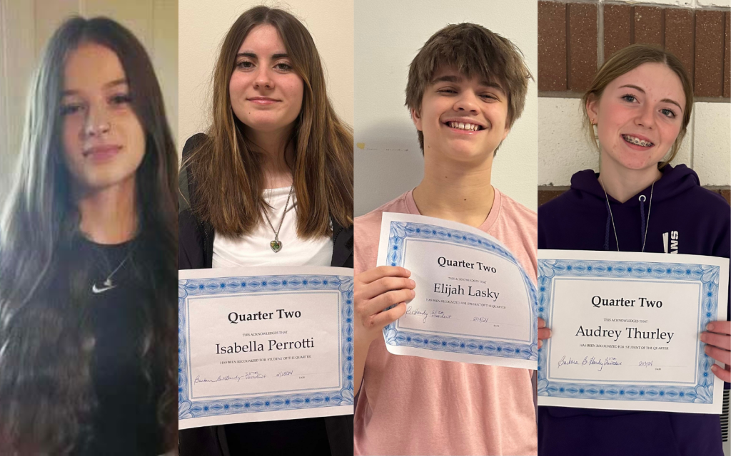 four students holding award certificates