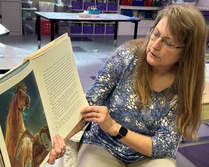 woman reads a book