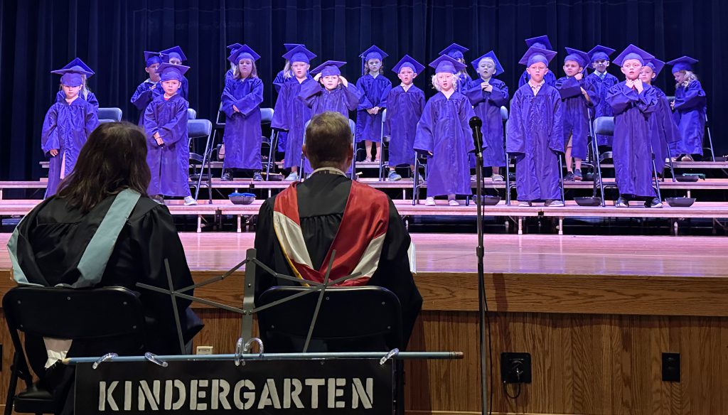 Kindergarten graduates on stage