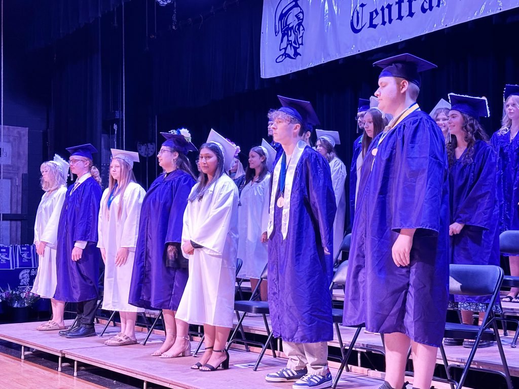 group of graduates on stage