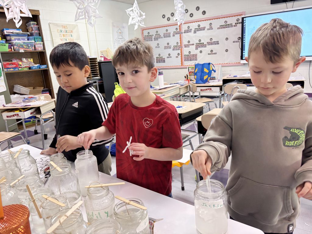 three boys make crystal snowflake ornament