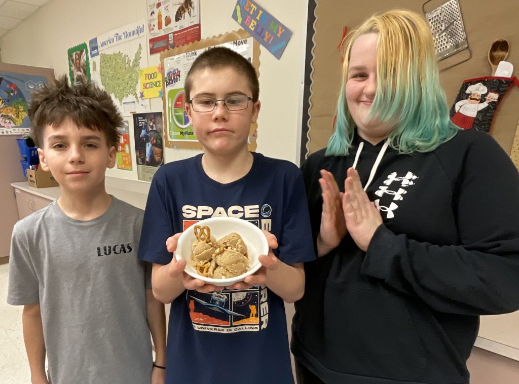 three students with their ice cream creation